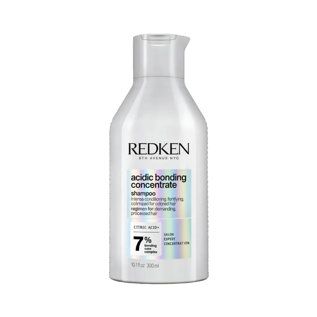 Redken acidic bonding concentrate shampoo bottle on a white background