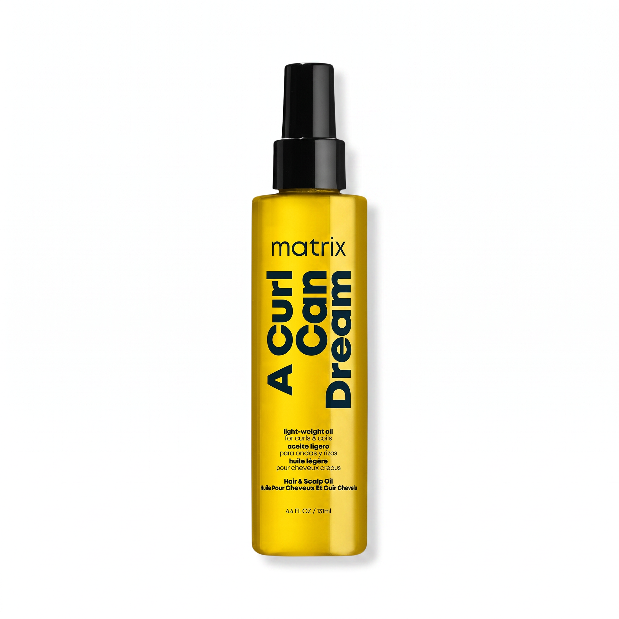 A bottle of Matrix A Curl Can Dream light-weight styling spray, featuring a metallic gold bottle and a black spray nozzle, set against a plain white background.