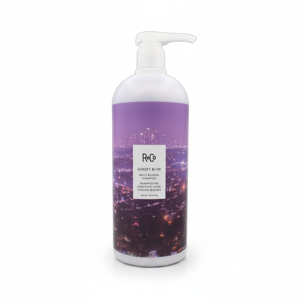 A bottle of PHD Co. Sunset Blvd Daily & Weekly Shampoo on a clean white background.