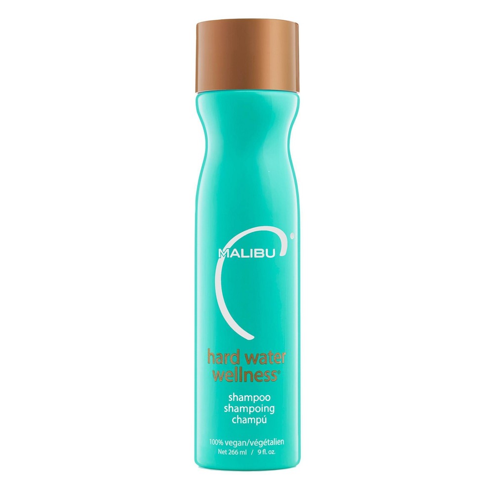 Turquoise shampoo bottle with brown cap on a white background