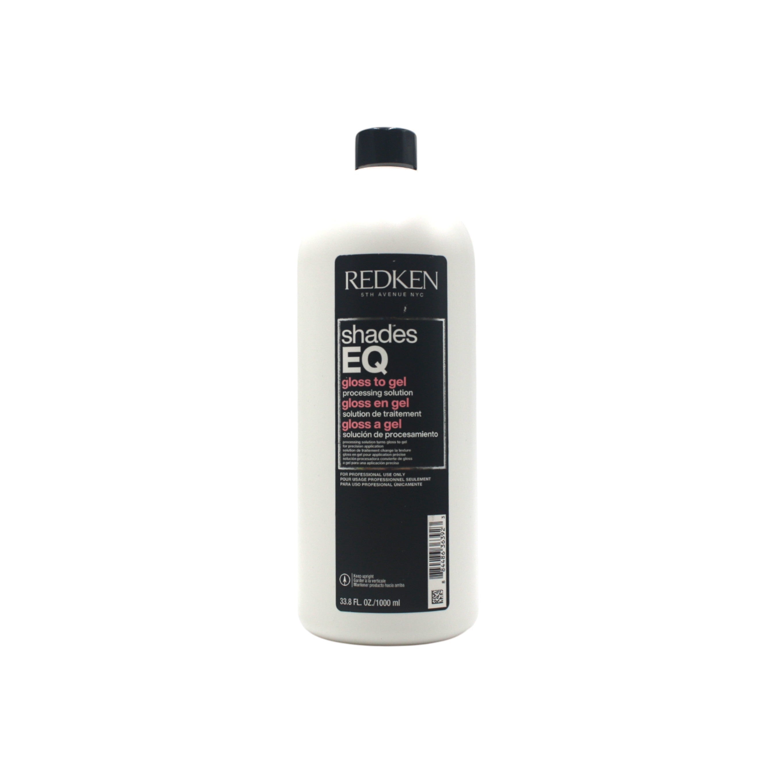 Redken Shades EQ hair color bottle on a white background