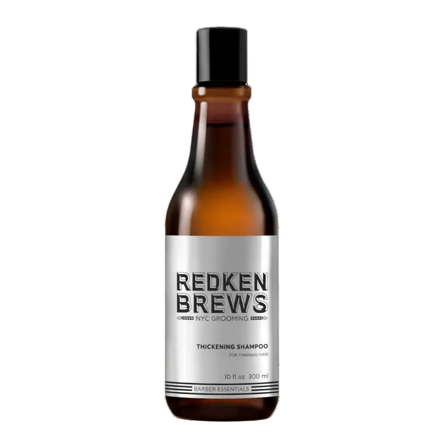 Redken Brews shampoo bottle on a white background