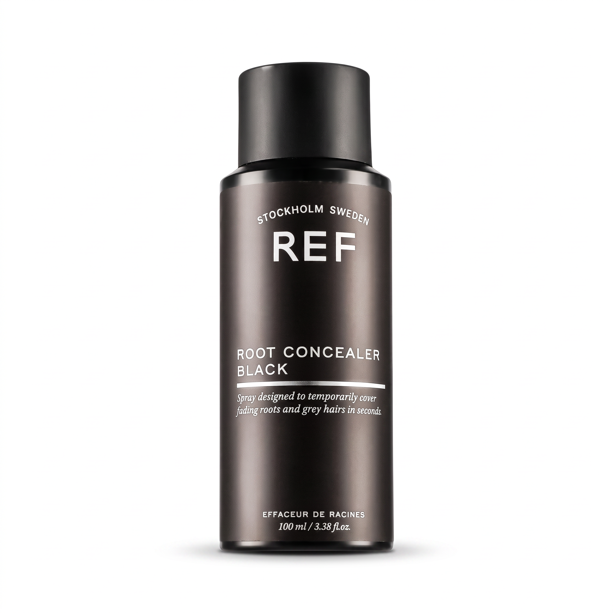 A 100ml bottle of REF Root Concealer Black on a clean white background. The bottle is a dark metallic brown with a black cap, featuring white text for the brand and product name.