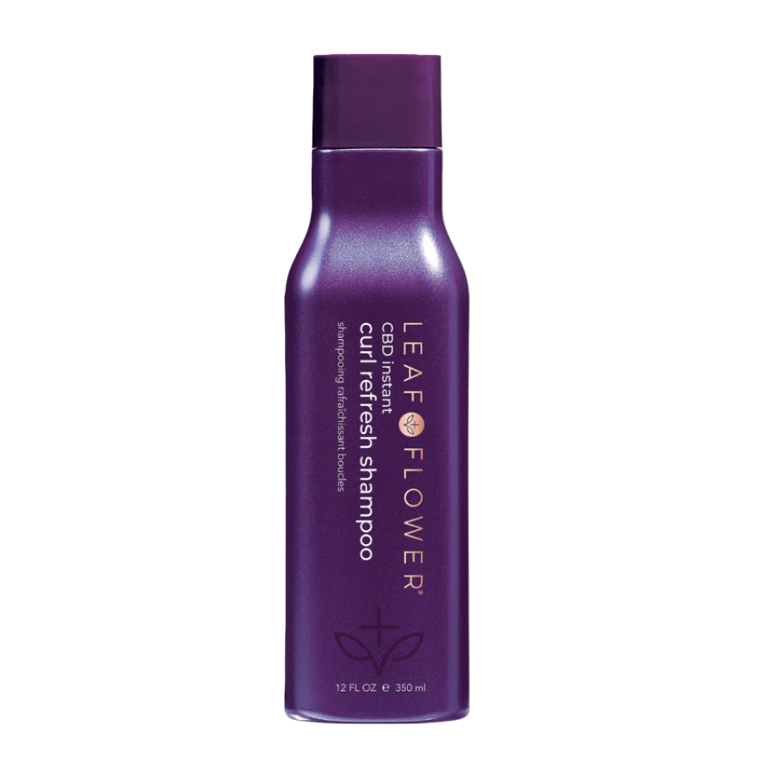 Purple shampoo bottle labeled 'Leaf Flower' on a white background