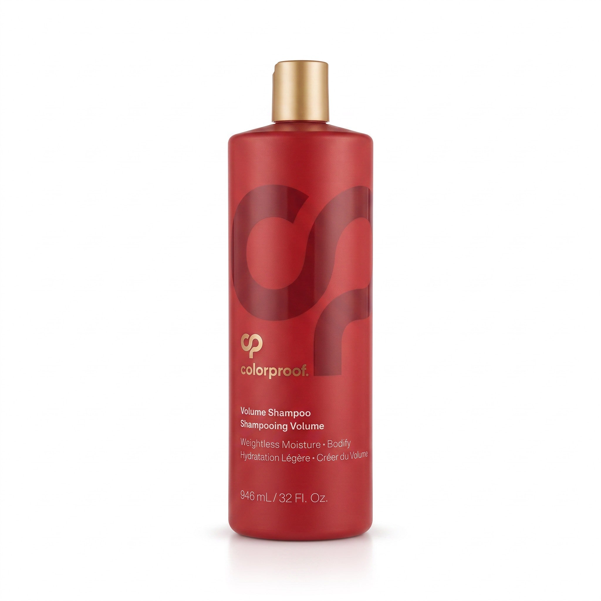 A bottle of Colorproof Volume Conditioner with a matte red body and a metallic gold cap, shown on a clean white background.