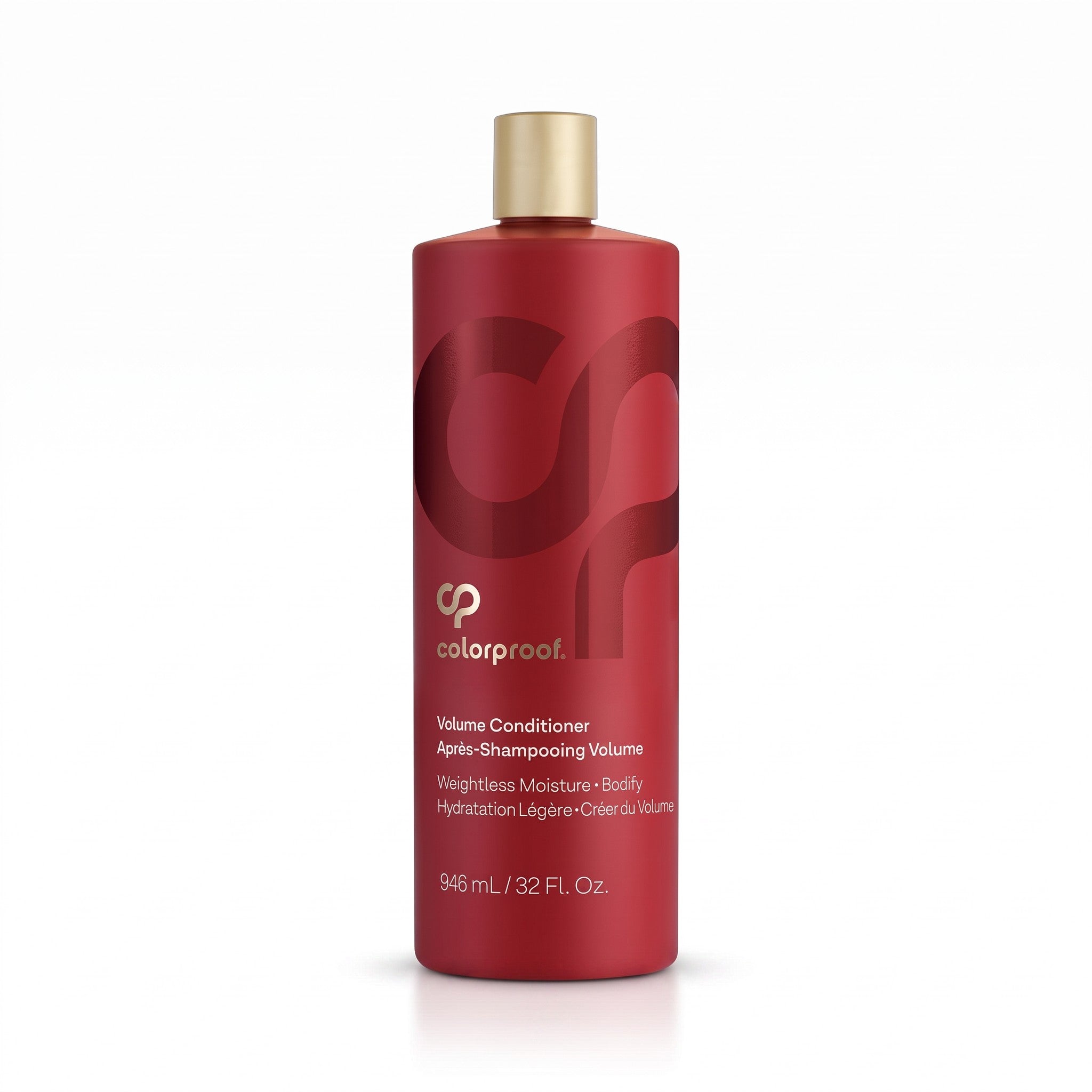 A bottle of Colorproof Volume Conditioner with a matte red body and a metallic gold cap, shown on a clean white background.